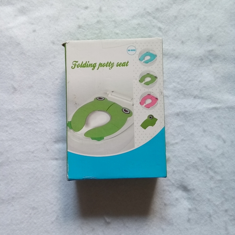 Folding potty seat